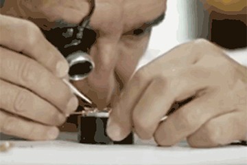 沈阳欧米茄表把维修多少钱